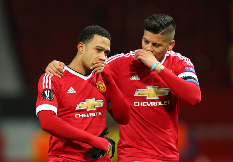 Memphis Depay og Marcos Rojo.