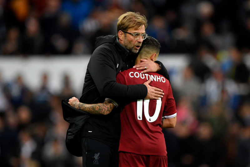 Klopp faðmar Coutinho.
