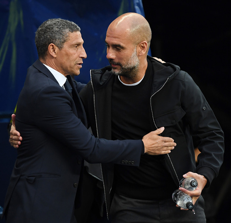 Hughton og Pep Guardiola.