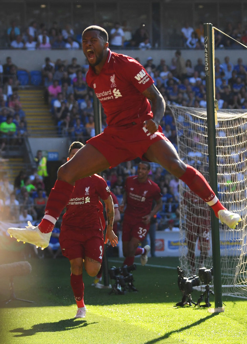 Gini Wijnaldum fagnar marki sínu í dag.