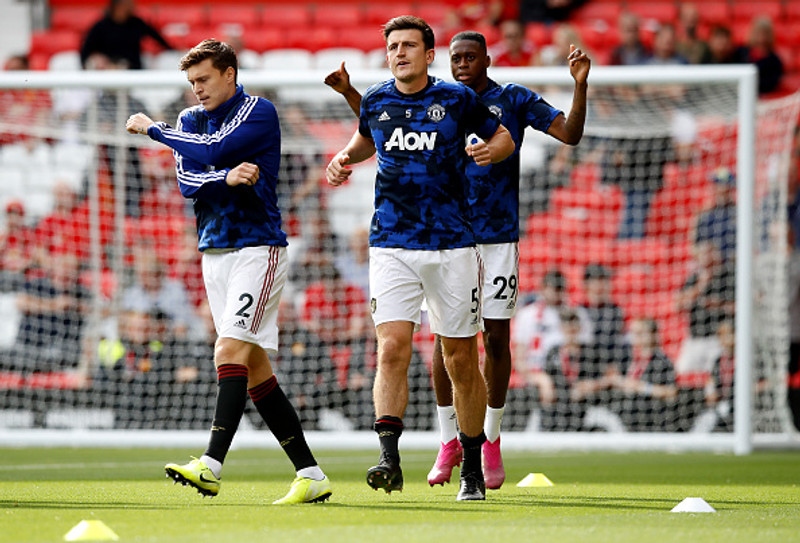 Victor Lindelöf og Harry Maguire. Á myndinni er líka hægri bakvörðurinn Aaron Wan-Bissaka.
