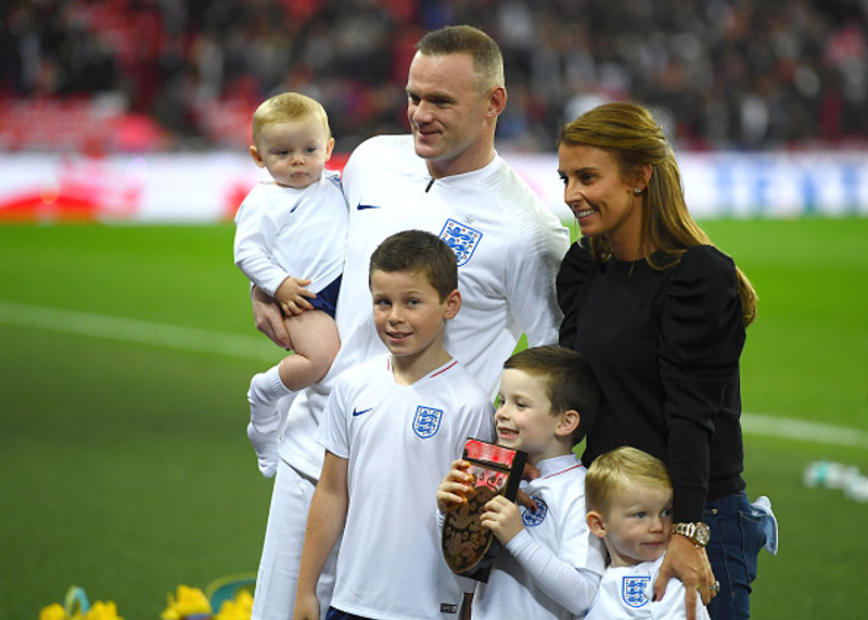 Coleen Rooney með eiginmanni sínum og fjórum drengjum.