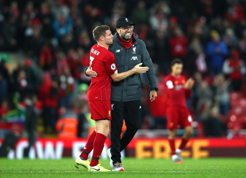 Milner og Klopp saman eftir sigurinn á Everton fyrr í mánuðinum.