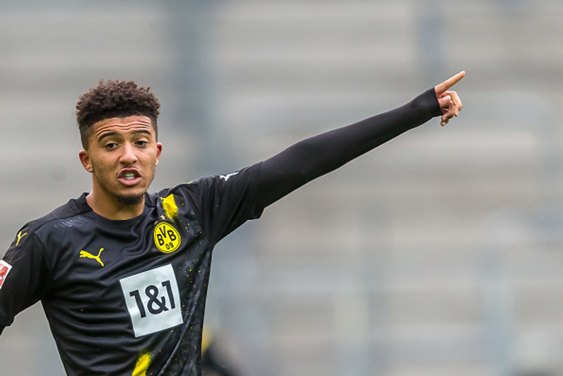 Jadon sancho í leik með Dortmund.