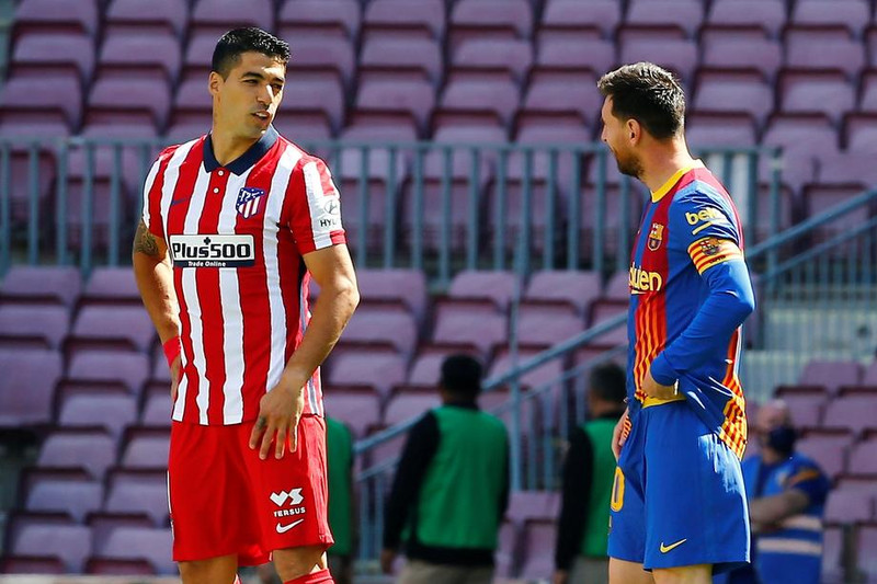 Luis Suarez og Lionel Messi.