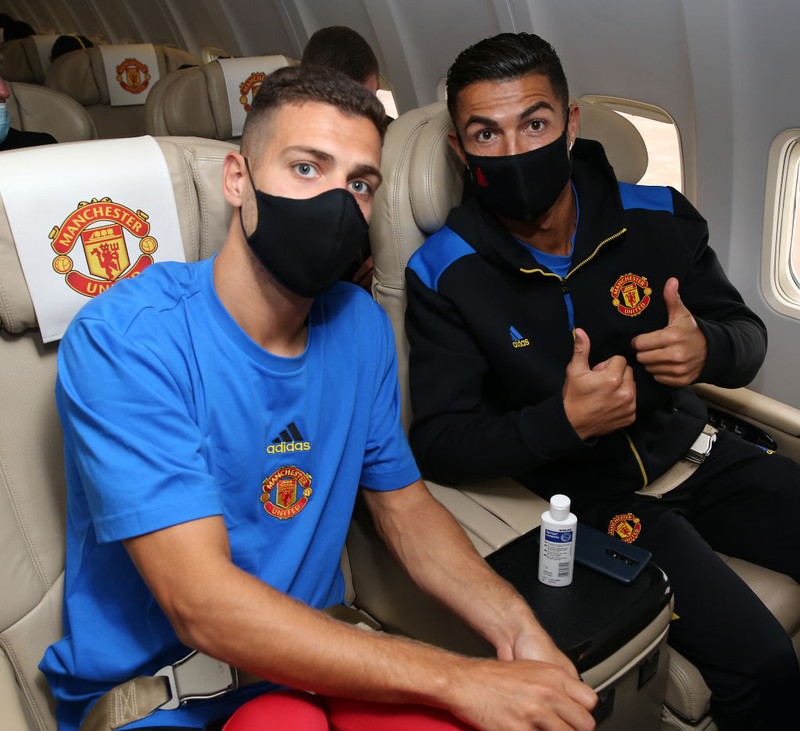 Diogo Dalot og Cristiano Ronaldo.