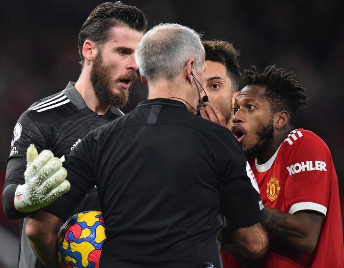 Fred og David De Gea mótmæla