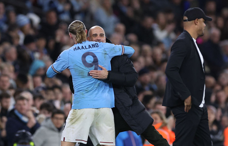 Pep Guardiola og Erling Braut Haaland