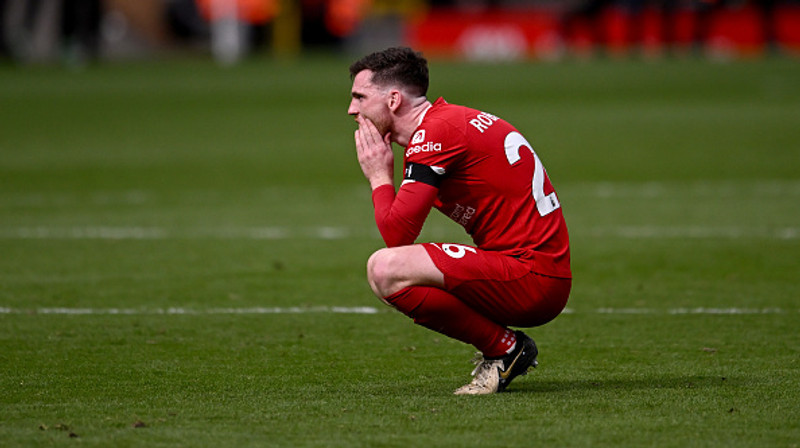 Andy Robertson bekkjaður.