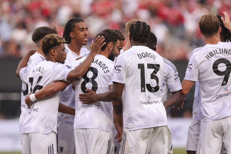 Man Utd fagnar marki á undirbúningstímabilinu.