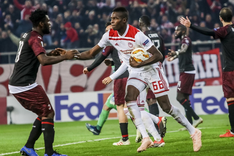Marki fagnað gegn AC Milan með Olympiakos.