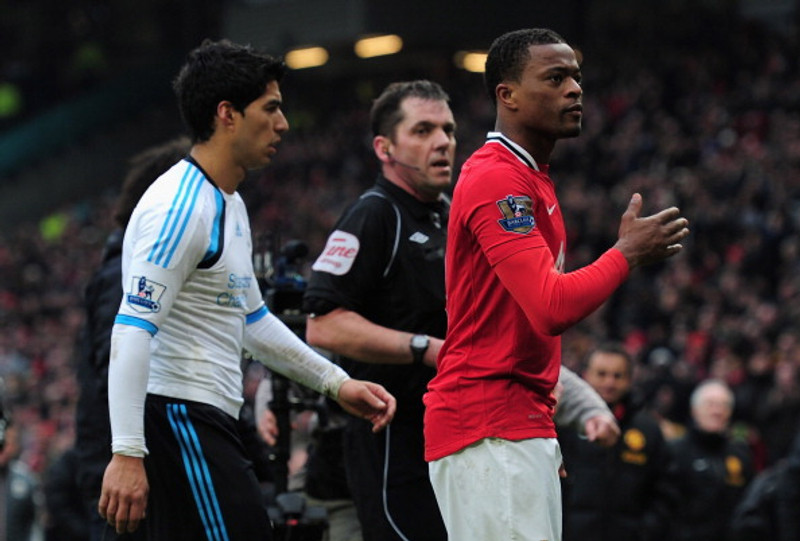 Luis Suarez og Patrice Evra.